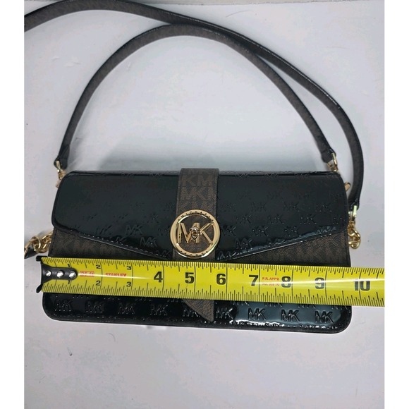 Michael Kors Greenwich medium logo-embossed patent leather shoulder bag in black - Picture 8 of 8